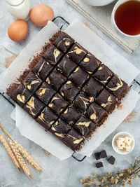 High angle view of cake,
flat lay photo of cream chesse brownies