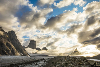 Mt. loki and mt. asgard emerge from the clouds as a storm blows over.