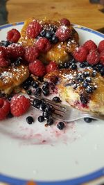 Close-up of strawberry served on table