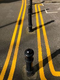 High angle view of poles on street