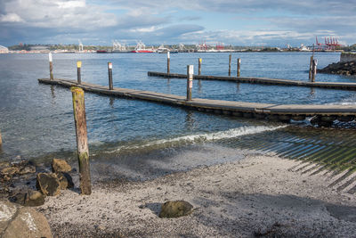 Pier over sea against sky