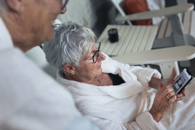 Senior woman using cell phone