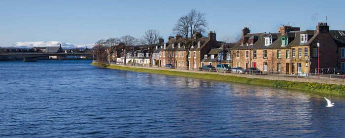 View of canal along buildings