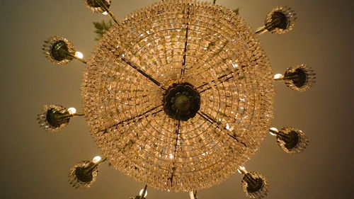 Low angle view of illuminated chandelier