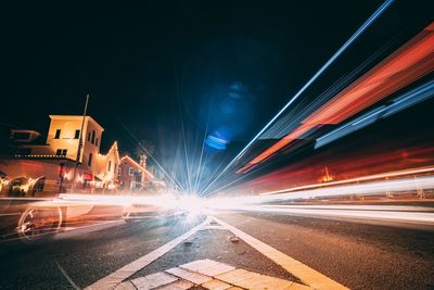 Light trails on city street at night