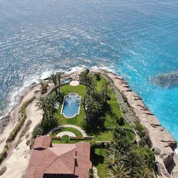 High angle view of swimming pool by sea