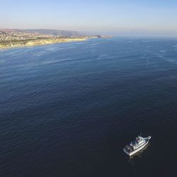 High angle view of boat in sea against sky