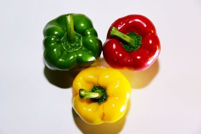 Close-up of bell peppers against white background