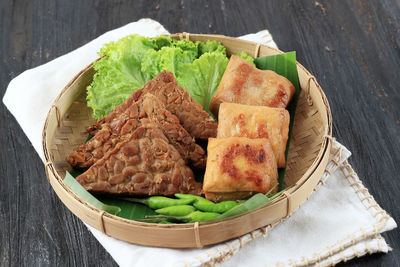 Tempe and tahu bacem, indonesian style spice seasoning with sweet and savory taste from java. 