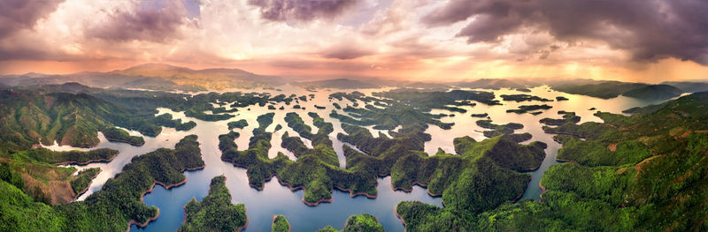 Panoramic view of mountains against sky during sunset