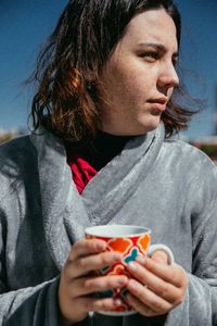 Close-up of a woman drinking glass