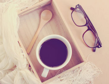 High angle view of coffee cup on table
