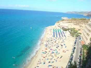 Scenic view of sea against blue sky