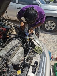 High angle view of man working on road