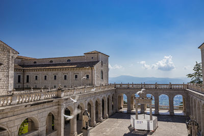 View of historical building against blue sky