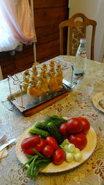 Close-up of tomatoes in plate on table