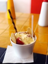 Close-up of ice cream in bowl on table