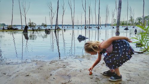 View of two people standing on shore