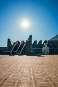 View of buildings against blue sky