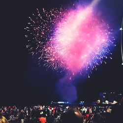 Firework display at night