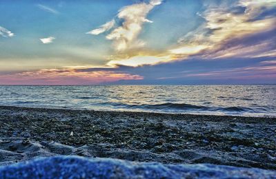 Scenic view of sea at sunset