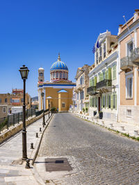 Built structures against clear blue sky