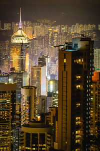 Illuminated buildings in city at night