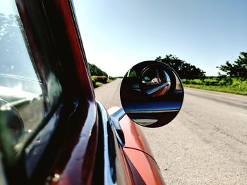 Close-up of vintage car on side-view mirror