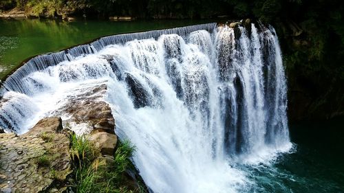 Scenic view of waterfall