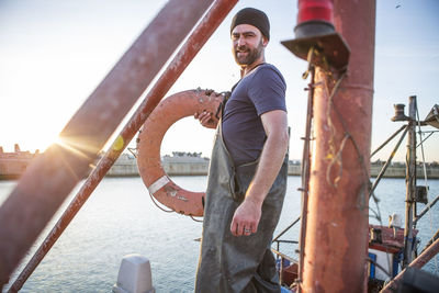 Fisherman working on trawler