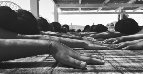 Group of people relaxing on bed