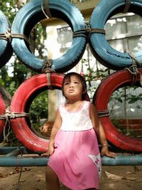 Full length of girl standing in playground