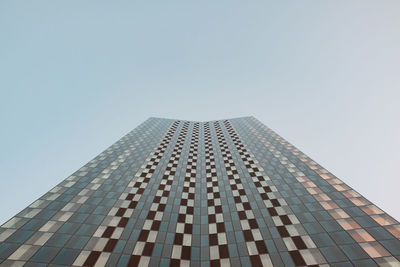 Low angle view of modern building against clear sky