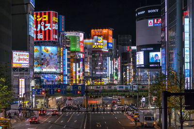 Illuminated buildings in city at night