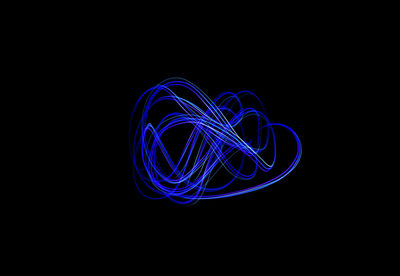 Light painting against black background