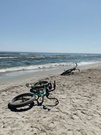 Scenic view of beach against clear sky