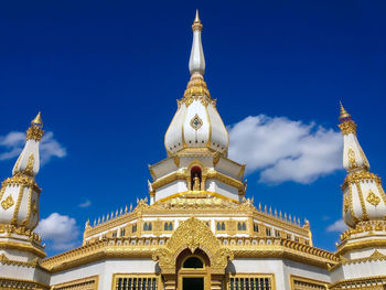 Low angle view of building against blue sky