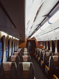 Empty seats in illuminated airplane