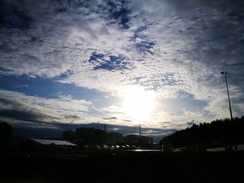 Silhouette landscape against sky during sunset