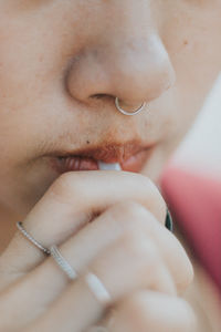 Close-up of young woman looking away