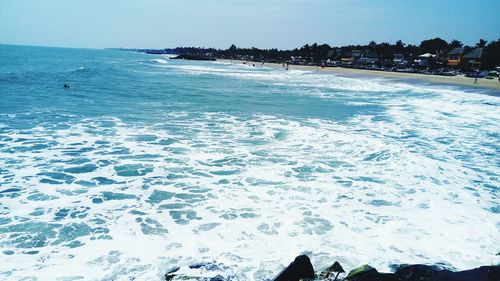 Scenic view of beach against clear sky