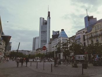 Buildings in city against sky