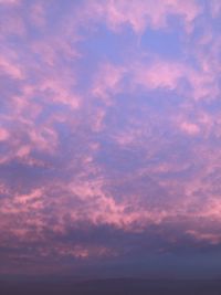 Low angle view of dramatic sky during sunset