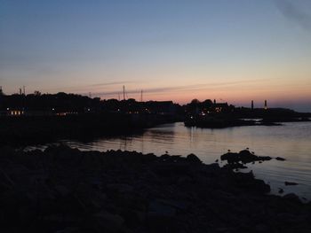 Scenic view of sea at sunset