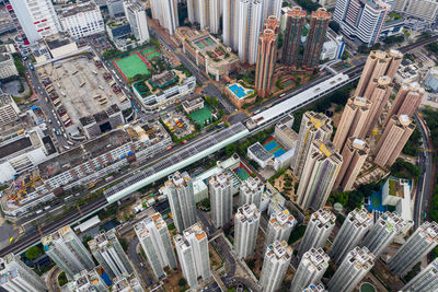 High angle view of street amidst buildings in city