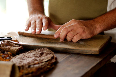 Making cuban cigars by hand in vinales, cuba.