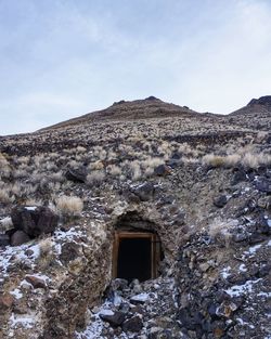 Entrance to an abandoned mine in the nevada mountains.