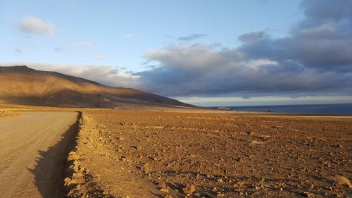 Scenic view of desert against sky