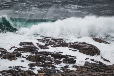 Waves splashing on rocks