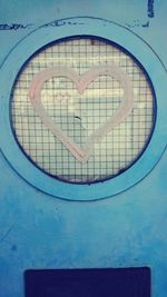 Close-up of heart shape on wall